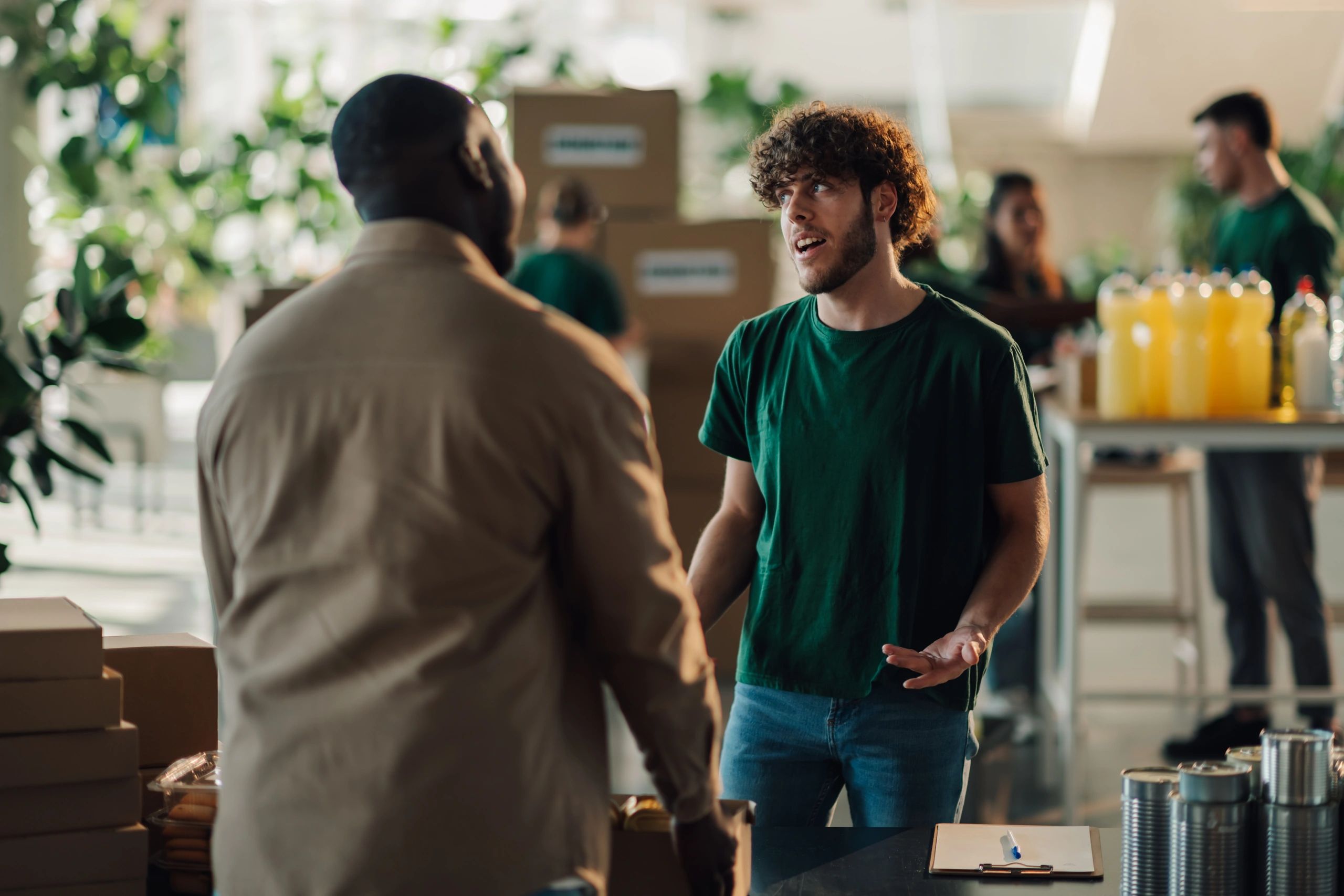 Volunteers organizing food donations for seniors