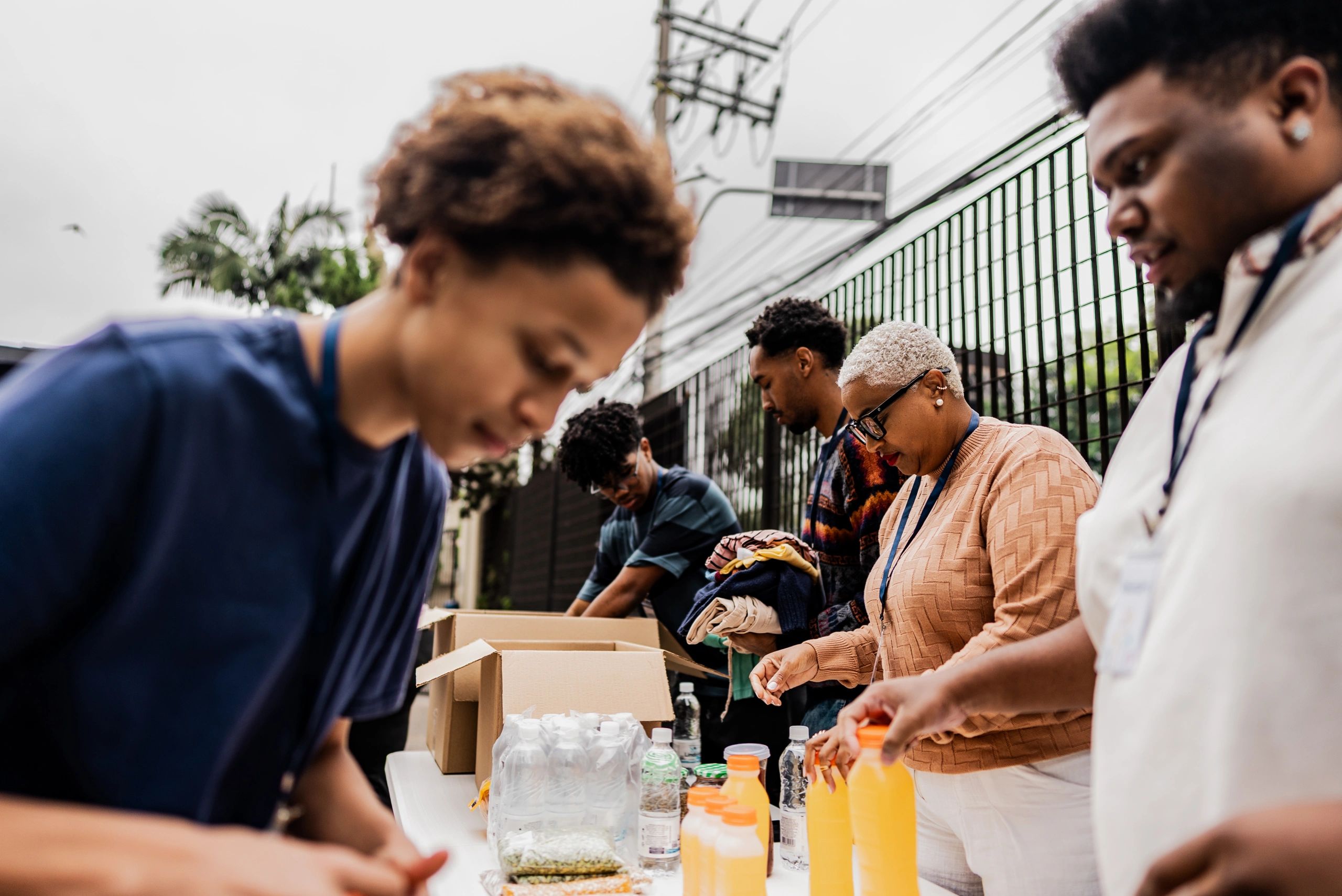 Volunteers sorting and organizing donated items